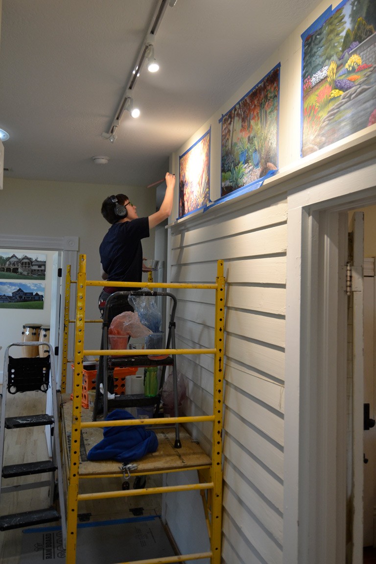 Katy Shepard at work on the Shelter Alternatives mural