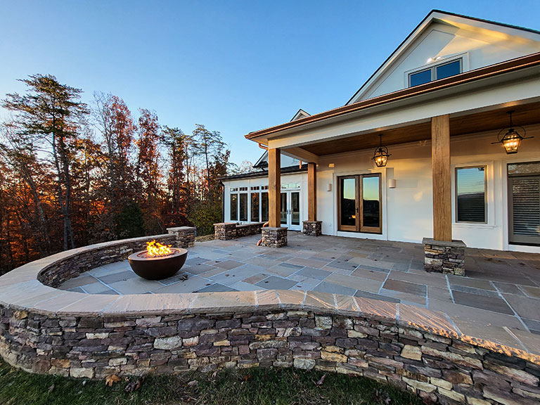 Photo of the a patio with a fire pit.